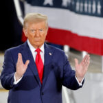 FILE PHOTO: Republican presidential nominee and former U.S. President Donald Trump gestures during a campaign event at Dorton Arena, in Raleigh, North Carolina, U.S. November 4, 2024.   REUTERS/Jonathan Drake/File Photo